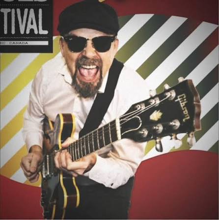 Little Leslie performing with an electric guitar